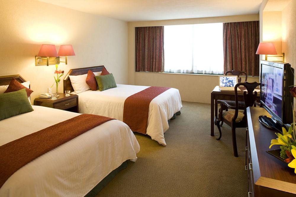 La Joya Pachuca Hotel Exterior photo A typical room at the hotel