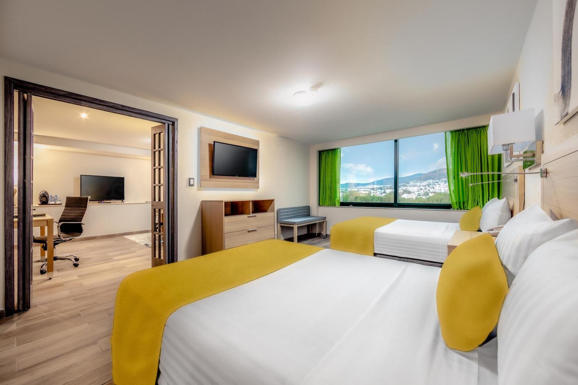 La Joya Pachuca Hotel Exterior photo A typical room at the hotel
