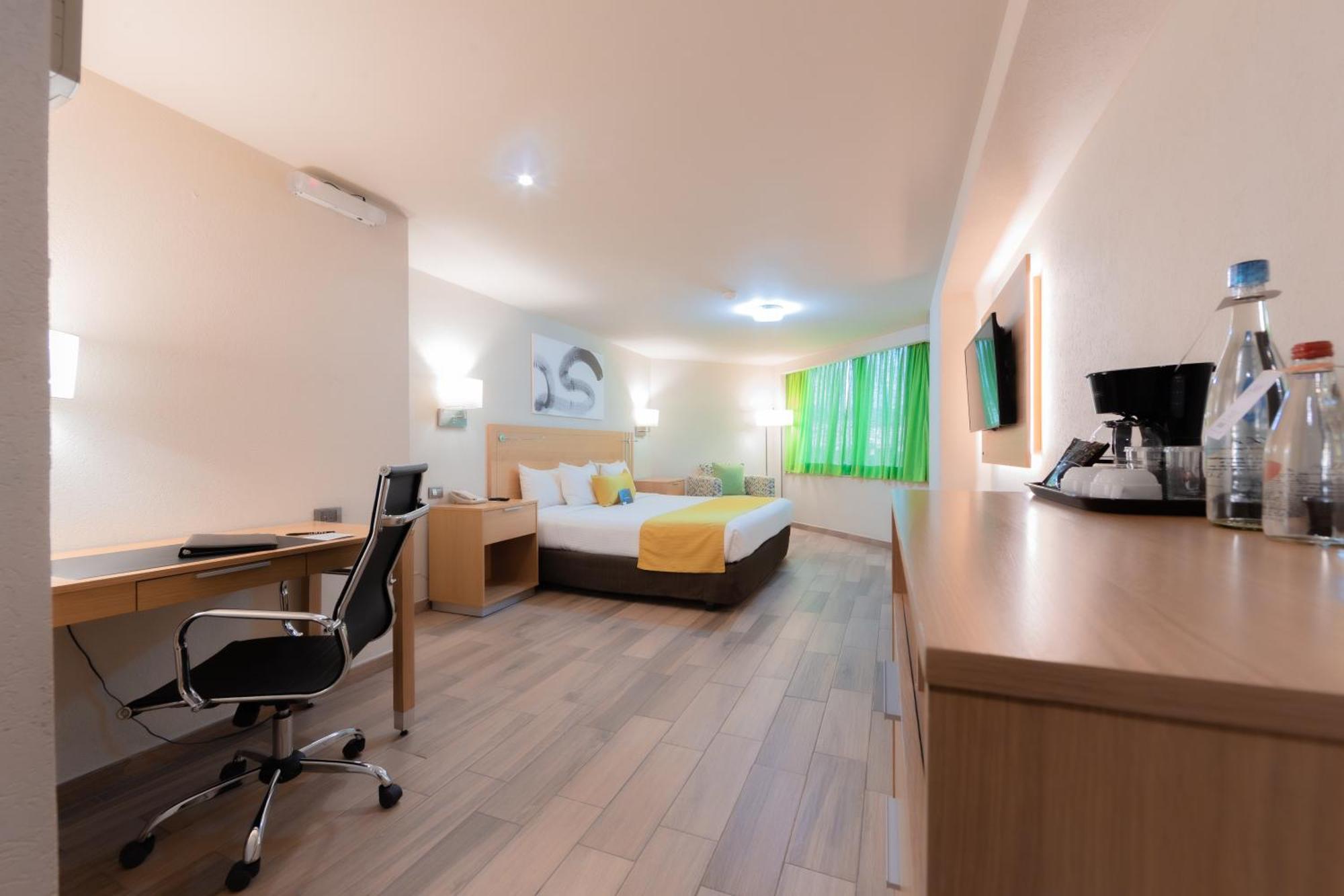 La Joya Pachuca Hotel Exterior photo A typical room at the hotel